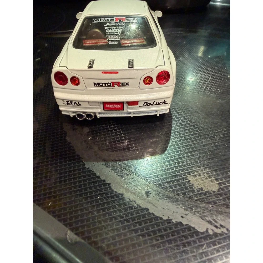 Jada Toys Import Racer Nissan Skyline GT-R R34 White MotoRex 1:24 Diecast Car